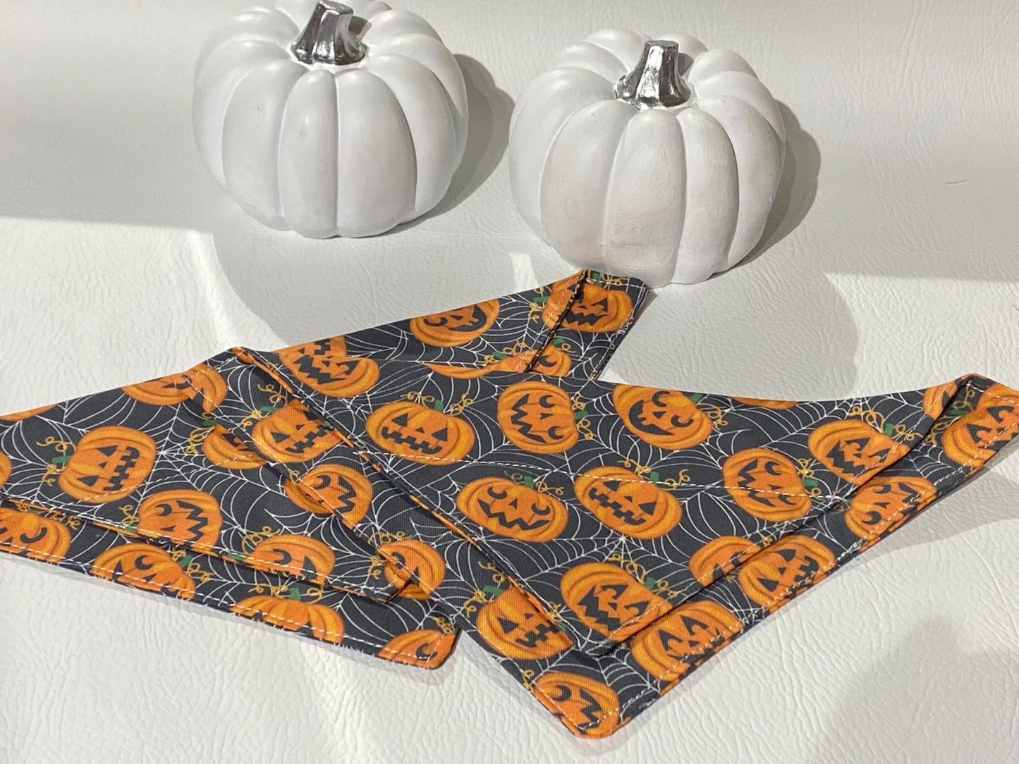 orange coloured pumpkin pattern fabric on the collar bandanas for dogs and cats.  Halloween theme