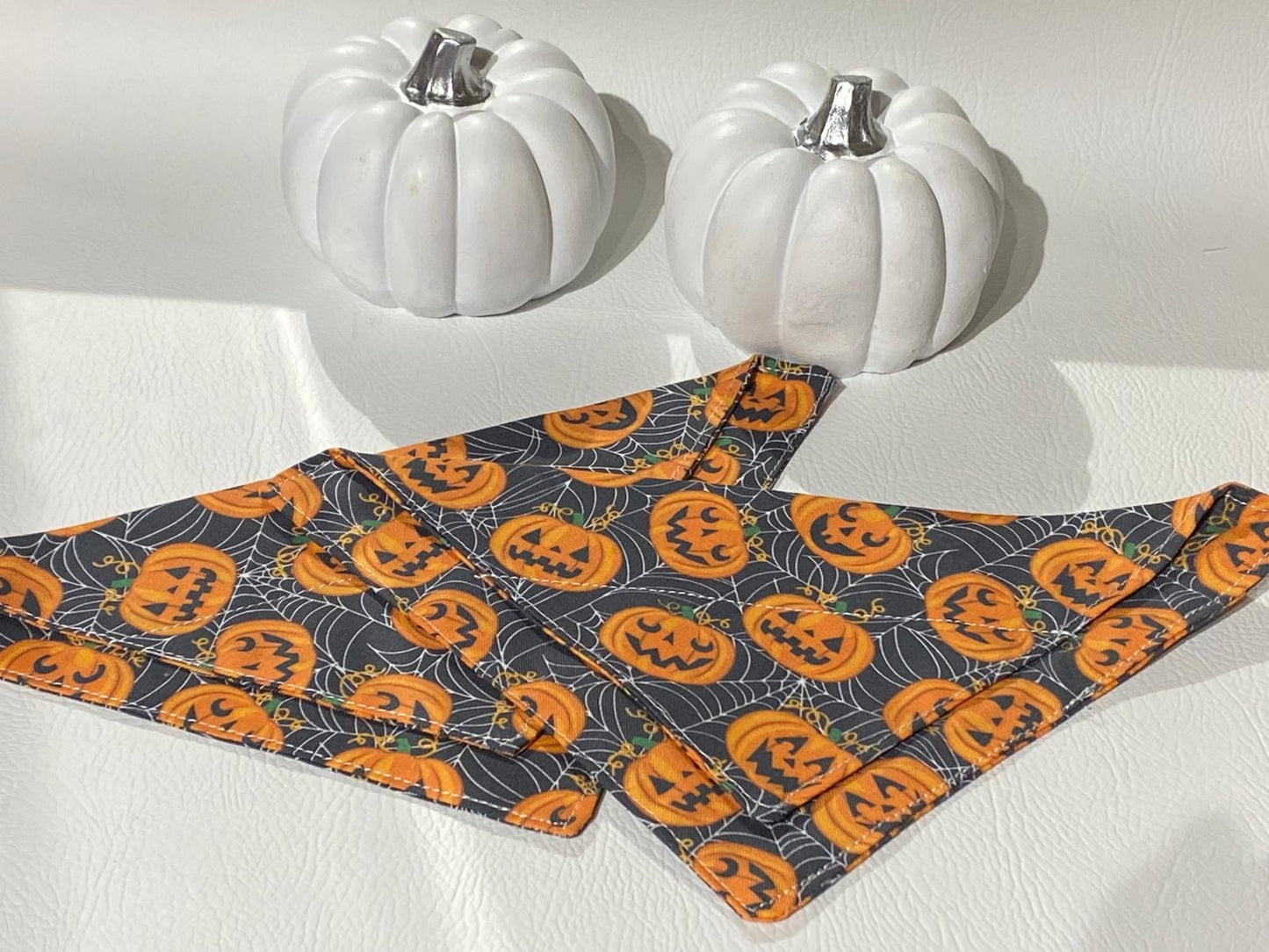 orange coloured pumpkin pattern fabric on the collar bandanas for dogs and cats.  Halloween theme